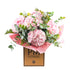 A pink bouquet of hydrangeas and eucalyptus, with the brand &