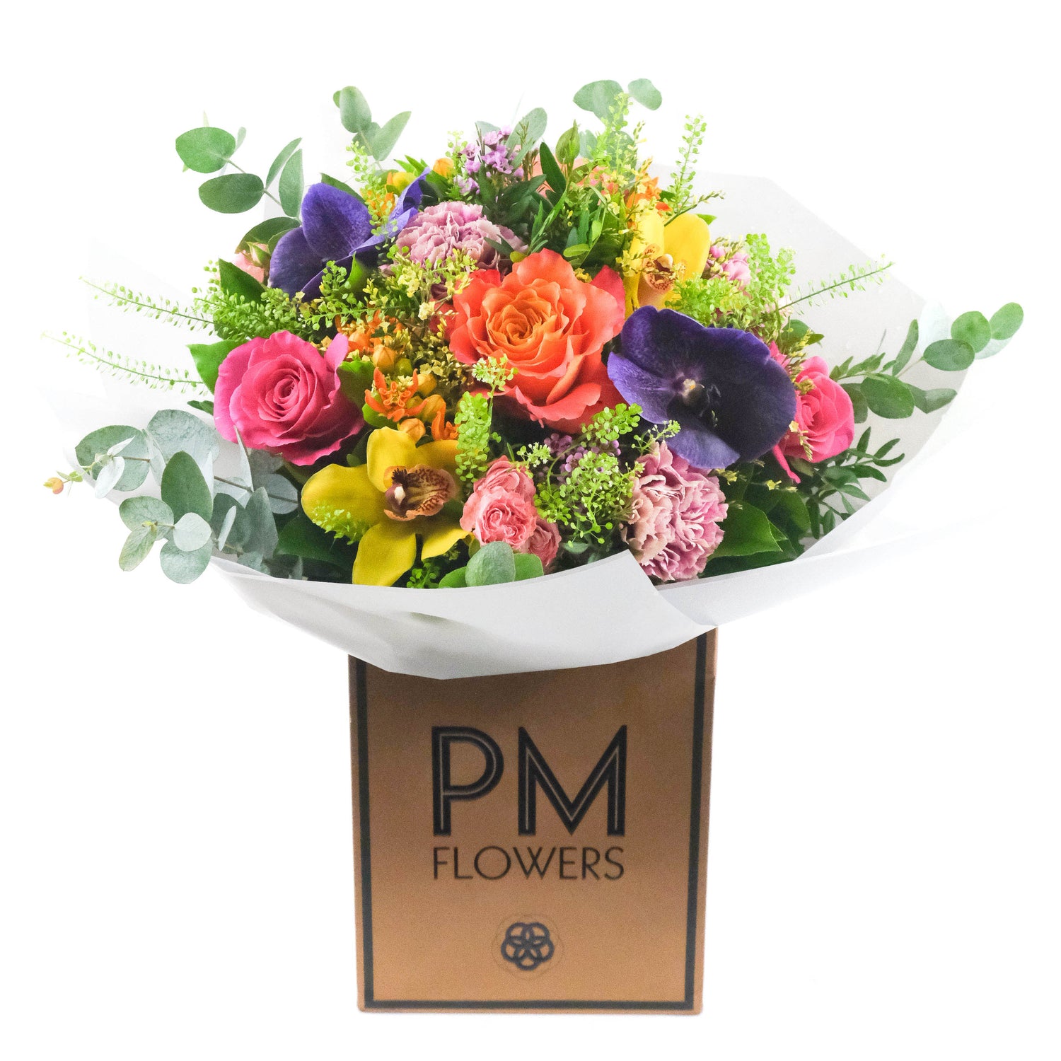 A bouquet of multicolored flowers including orange, pink, and purple, arranged with green foliage accents, presented in a PM Flowers packaging.